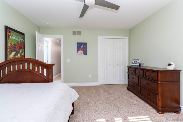 6081 Byram Lake Dr, Linden, MI 48451 - bedroom featuring a closet, light carpet, and ceiling fan