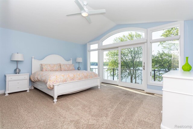 6081 Byram Lake Dr, Linden, MI 48451 - carpeted bedroom featuring access to outside, vaulted ceiling, and a ceiling fan