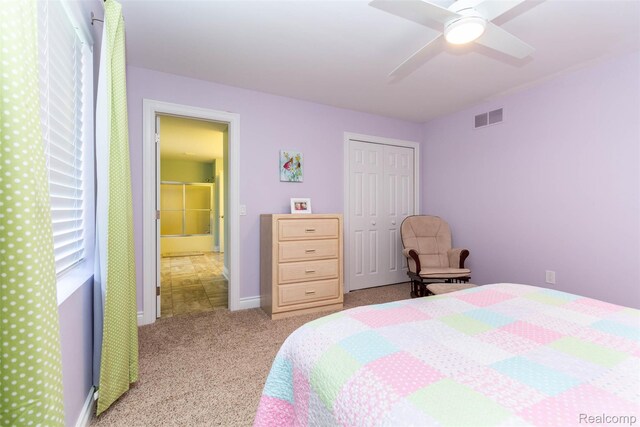 6081 Byram Lake Dr, Linden, MI 48451 - bedroom featuring a closet, carpet, and ceiling fan