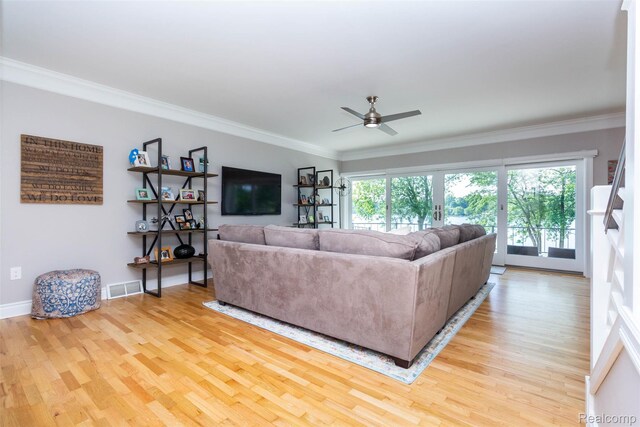 6081 Byram Lake Dr, Linden, MI 48451 - living room featuring light wood-type flooring, ceiling fan, and crown molding