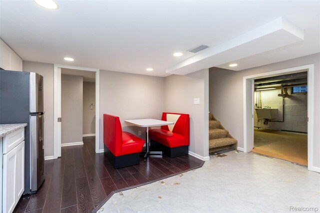 6081 Byram Lake Dr, Linden, MI 48451 - dining space with recessed lighting, stairs, and wood finished floors