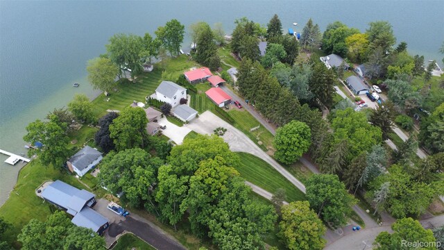 6081 Byram Lake Dr, Linden, MI 48451 - aerial view of property and surrounding area with nearby suburban area