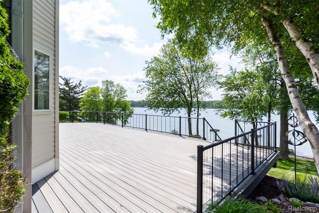 6081 Byram Lake Dr, Linden, MI 48451 - wooden deck featuring a water view
