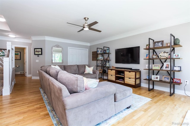 6081 Byram Lake Dr, Linden, MI 48451 - living room with a ceiling fan, light wood-style flooring, and ornamental molding