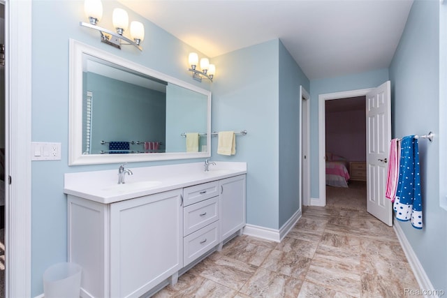 6081 Byram Lake Dr, Linden, MI 48451 - full bathroom with double vanity, ensuite bathroom, and marble finish flooring