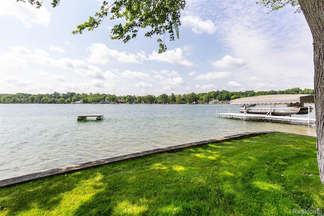 6081 Byram Lake Dr, Linden, MI 48451 - dock area featuring a water view and a yard
