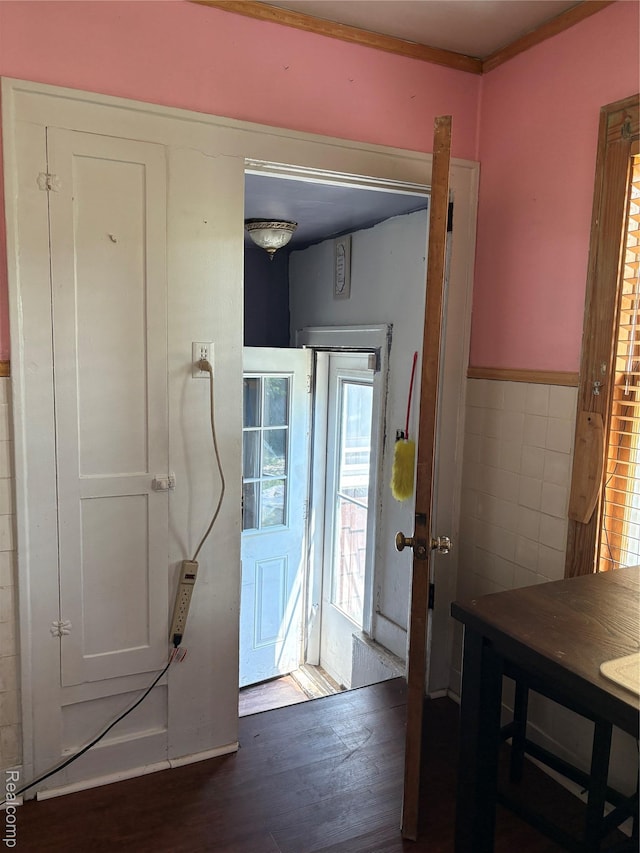 4206 Devonshire Rd, Lincoln Park, MI 48224 - entryway with wood finished floors, a wainscoted wall, and tile walls