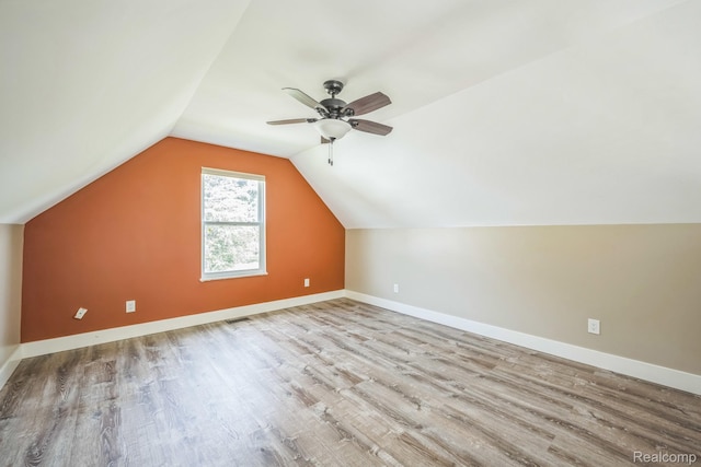 6195 Falkenbury Rd, North Branch, MI 48461 - bonus room with wood finished floors, ceiling fan, baseboards, and vaulted ceiling