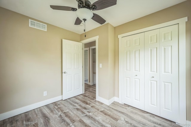 6195 Falkenbury Rd, North Branch, MI 48461 - unfurnished bedroom featuring wood finished floors, baseboards, a closet, and ceiling fan