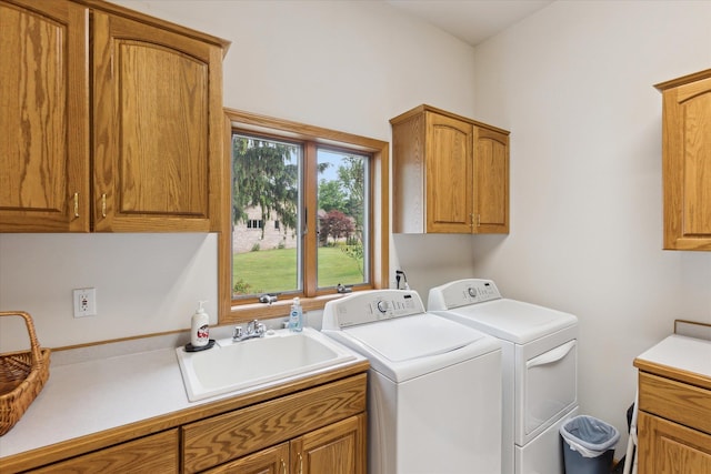 3438 Sandy Shore Dr, Metamora, MI 48455 - laundry room with cabinet space and independent washer and dryer