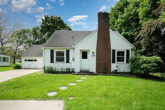 2958 E Stewart Rd, Midland, MI 48640 - view of front of property featuring a chimney, driveway, a front lawn, and a garage
