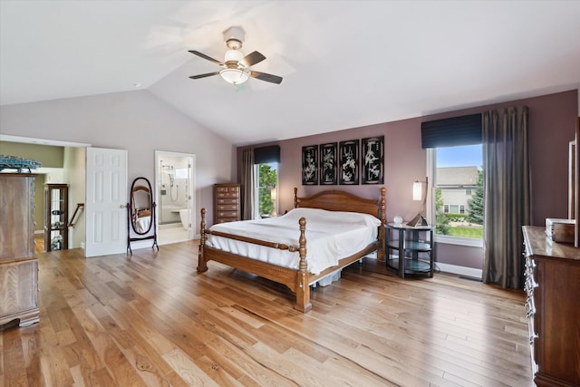 2056 Merlot Ct, Ann Arbor, MI 48108 - bedroom with light wood-style floors, vaulted ceiling, connected bathroom, a ceiling fan, and baseboards