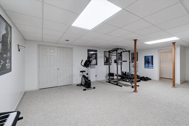 2056 Merlot Ct, Ann Arbor, MI 48108 - workout room featuring carpet flooring, a paneled ceiling, and baseboards