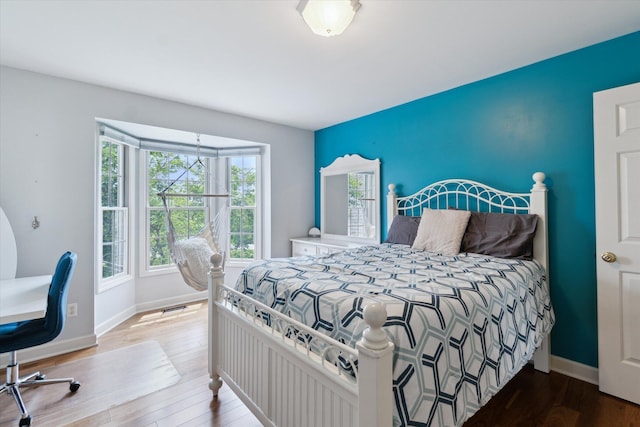2056 Merlot Ct, Ann Arbor, MI 48108 - bedroom featuring wood finished floors and baseboards