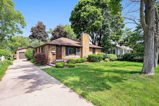 1018 Ruddiman Dr, North Muskegon, MI 49445 - view of front of property with a chimney, brick siding, an outdoor structure, and a front lawn