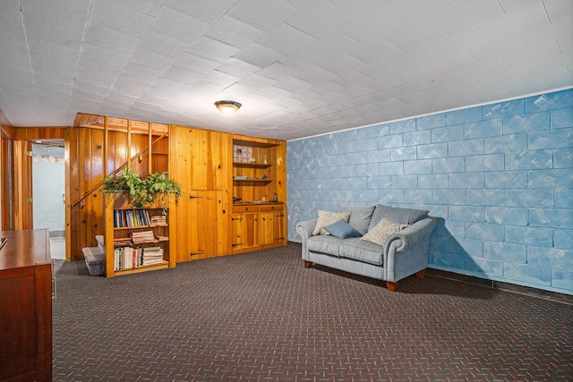 1018 Ruddiman Dr, North Muskegon, MI 49445 - unfurnished room with carpet floors and wood walls