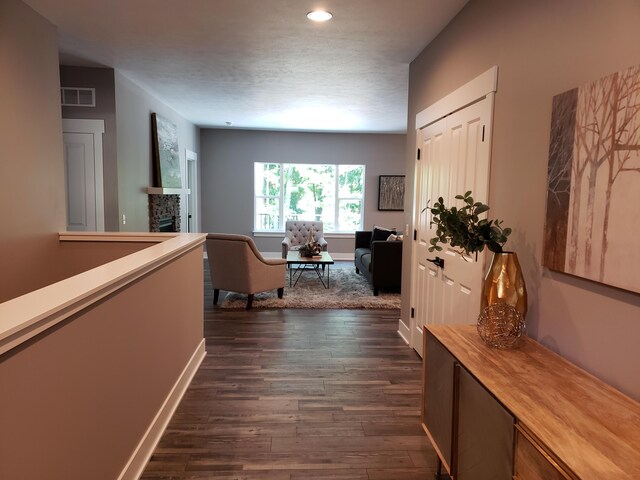 9421 Sassafras Trl Unit 76, Portage, MI 49002 - hallway with dark wood-style flooring and recessed lighting