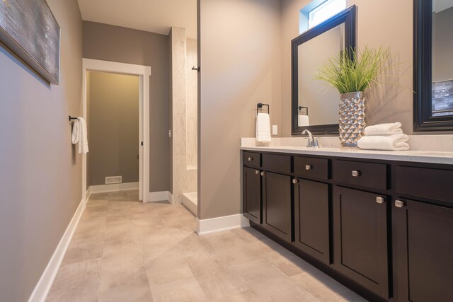 9421 Sassafras Trl Unit 76, Portage, MI 49002 - bathroom with vanity and a tile shower