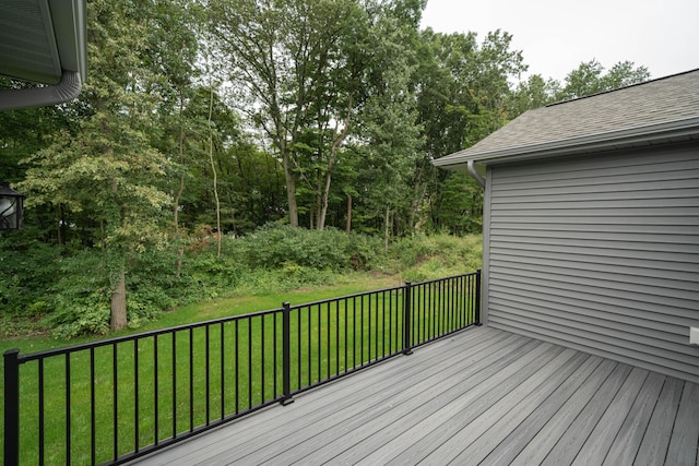9421 Sassafras Trl Unit 76, Portage, MI 49002 - wooden terrace with a lawn