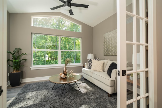 9421 Sassafras Trl Unit 76, Portage, MI 49002 - living room with a ceiling fan, vaulted ceiling, and wood finished floors