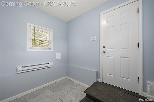 233 W 11 Mile Rd, Madison Heights, MI 48071 - doorway with baseboards and a baseboard radiator