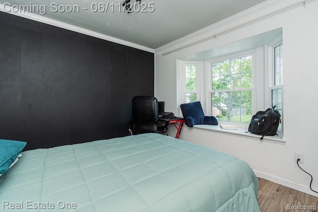 104 Manor Way Unit 1, Rochester Hills, MI 48309 - bedroom featuring wood finished floors, crown molding, and baseboards