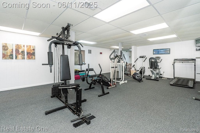 104 Manor Way Unit 1, Rochester Hills, MI 48309 - workout area featuring a drop ceiling and baseboards