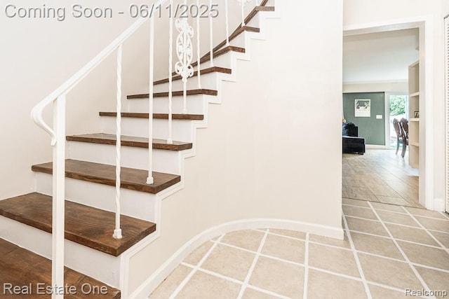 104 Manor Way Unit 1, Rochester Hills, MI 48309 - stairs featuring baseboards and tile patterned floors