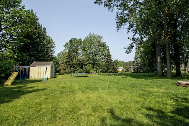 7070 Quain Rd, Birch Run, MI 48415 - view of grassy yard with a playground
