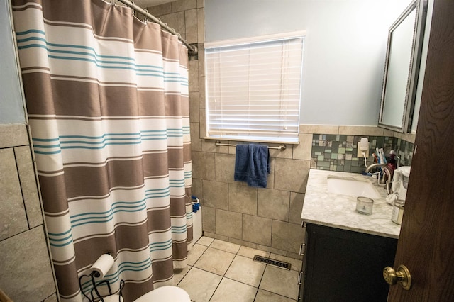 7070 Quain Rd, Birch Run, MI 48415 - bathroom featuring tile walls, vanity, toilet, a shower with curtain, and tile patterned flooring