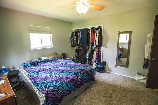7070 Quain Rd, Birch Run, MI 48415 - carpeted bedroom featuring multiple windows, a closet, and a ceiling fan