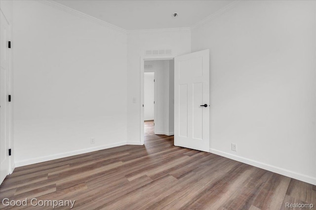 2826 16th St, Detroit, MI 48216 - unfurnished room with wood finished floors and ornamental molding