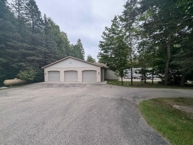 8544 Esmond Rd, Hale, MI 48739 - view of front of home featuring a garage and an outbuilding