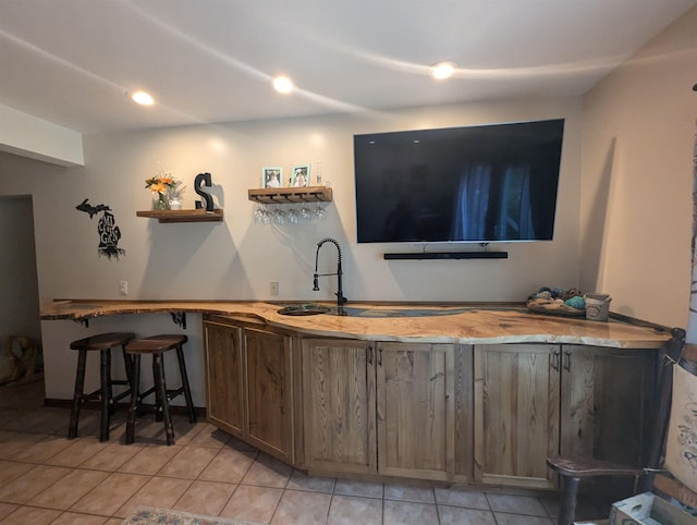 8544 Esmond Rd, Hale, MI 48739 - indoor wet bar featuring light tile patterned flooring and recessed lighting