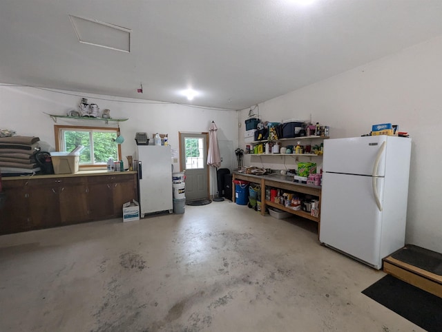 8544 Esmond Rd, Hale, MI 48739 - garage with freestanding refrigerator