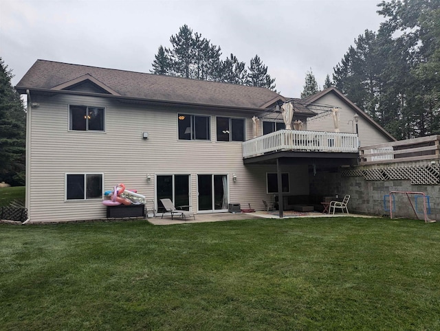 8544 Esmond Rd, Hale, MI 48739 - rear view of property with a patio area, a wooden deck, and a yard