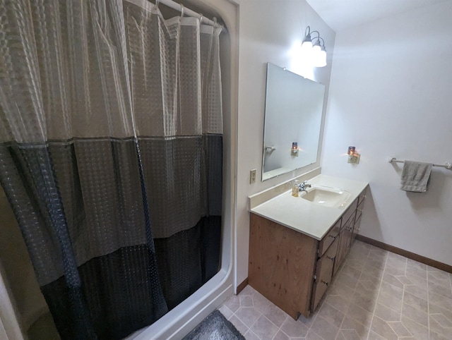 8544 Esmond Rd, Hale, MI 48739 - full bathroom with vanity, tile patterned flooring, and a shower with shower curtain