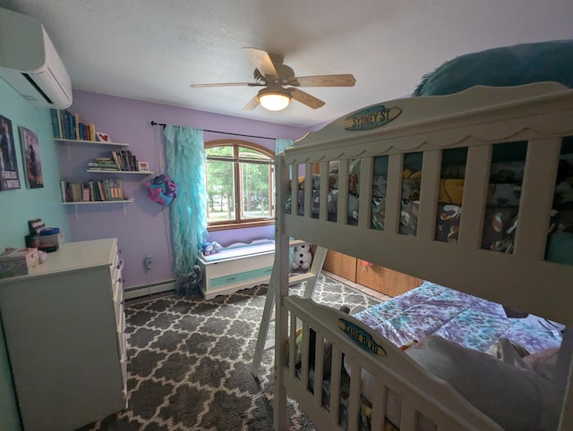 8544 Esmond Rd, Hale, MI 48739 - bedroom featuring an AC wall unit, a baseboard heating unit, and ceiling fan