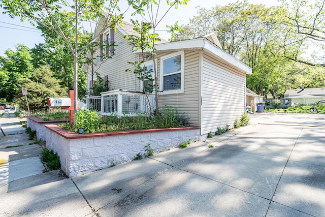 2110 Saint Charles Ave SW, Grand Rapids, MI 49507 - view of side of home featuring driveway