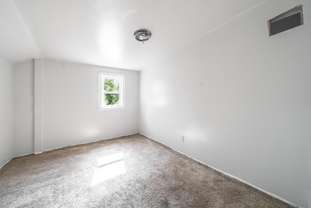 2110 Saint Charles Ave SW, Grand Rapids, MI 49507 - bonus room with carpet flooring and vaulted ceiling