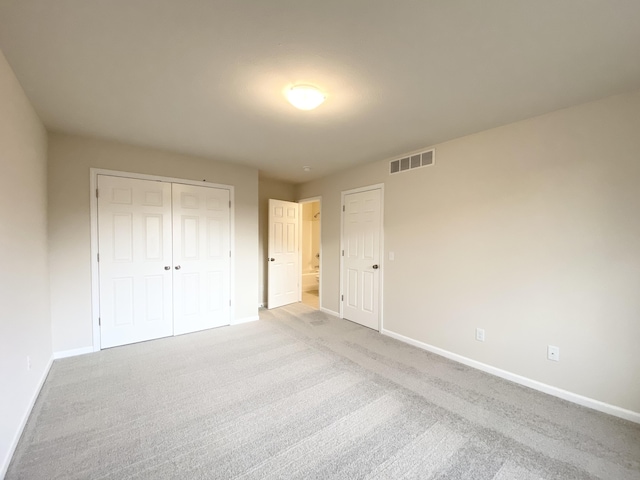 4272 Butternut Dr, Wayland, MI 49348 - unfurnished bedroom with baseboards, carpet, and a closet