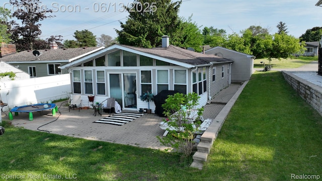 579 Dunleavy Dr, Highland, MI 48356 - rear view of house with a patio area