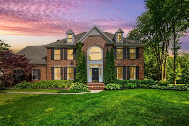 3265 Estates Dr, Saint Joseph, MI 49085 - colonial inspired home with brick siding and a yard