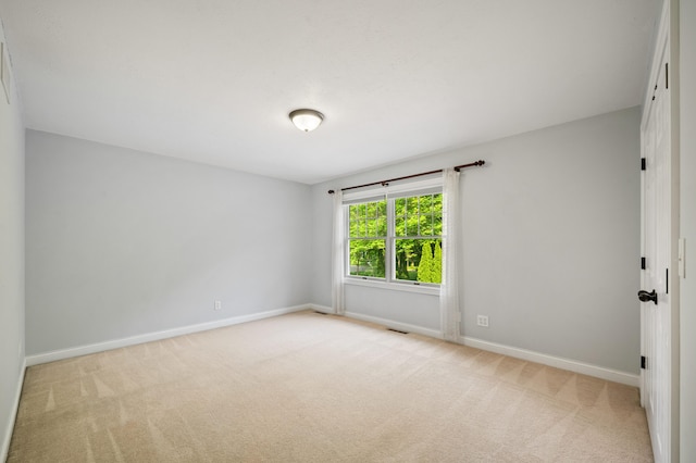 3265 Estates Dr, Saint Joseph, MI 49085 - empty room featuring carpet flooring and baseboards