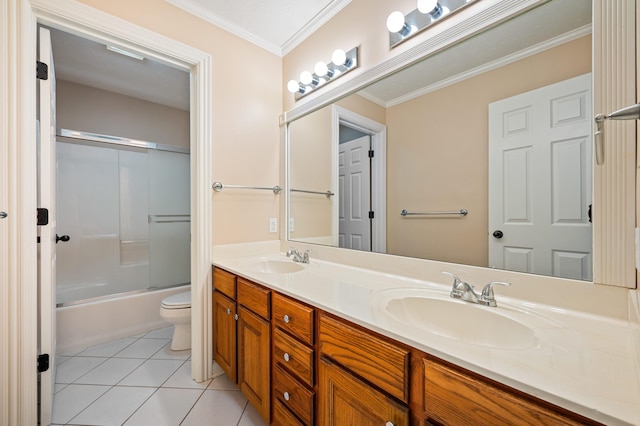 3265 Estates Dr, Saint Joseph, MI 49085 - bathroom featuring toilet, double vanity, crown molding, tile patterned flooring, and shower / bath combination with glass door
