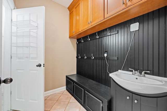 3265 Estates Dr, Saint Joseph, MI 49085 - mudroom featuring a sink, light tile patterned floors, and baseboards