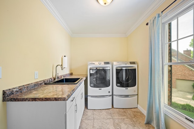 3265 Estates Dr, Saint Joseph, MI 49085 - washroom featuring washer and dryer, ornamental molding, cabinet space, and baseboards