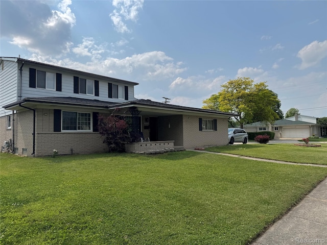 30347 Dell Ln, Warren, MI 48092 - view of front of property featuring brick siding, a front lawn, and a garage