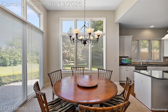 13815 Silent Woods Dr, Shelby Twp, MI 48315 - dining room featuring a chandelier, dark colored carpet, and recessed lighting