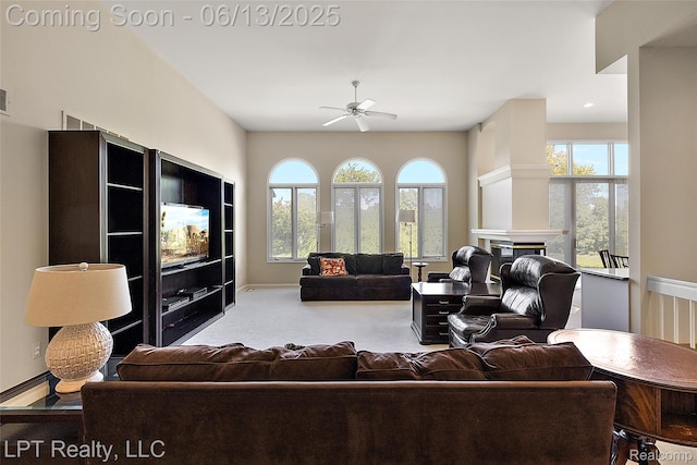 13815 Silent Woods Dr, Shelby Twp, MI 48315 - carpeted living room featuring ceiling fan and a glass covered fireplace